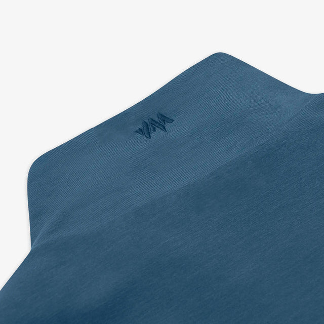 A close up view of the Jellymud Men's Peak Quarter Zip Sweatshirt featuring an embroidered logo on the collar.