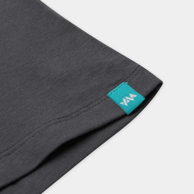 Close-up of the Jellymud branding on the sleeve of the men's charcoal bamboo t-shirt. The branding adds a subtle and stylish touch to the shirt, showcasing the brand's commitment to quality and design.