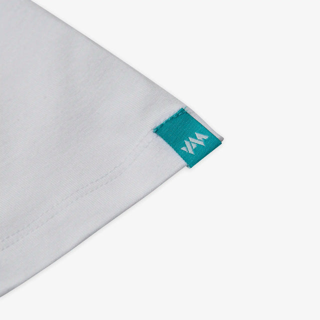 Women's White Bamboo T-Shirt. Close up view of embroidered label on sleeve. 